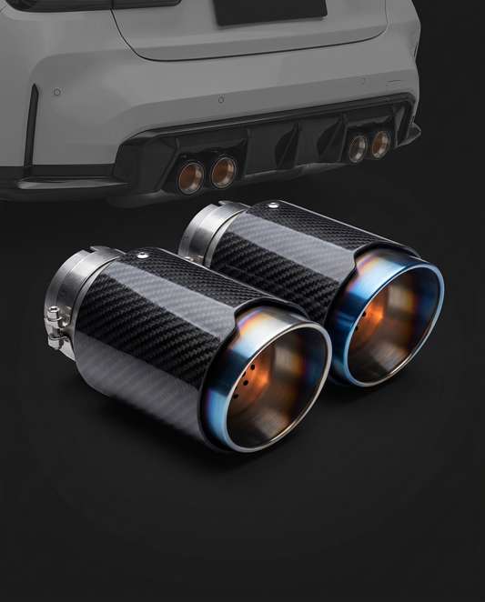 Flat-cut carbon fiber exhaust tips with burnt titanium finish for BMW G8X, rear ghosted, heat-gradient bluing and 2x2 twill sleeve