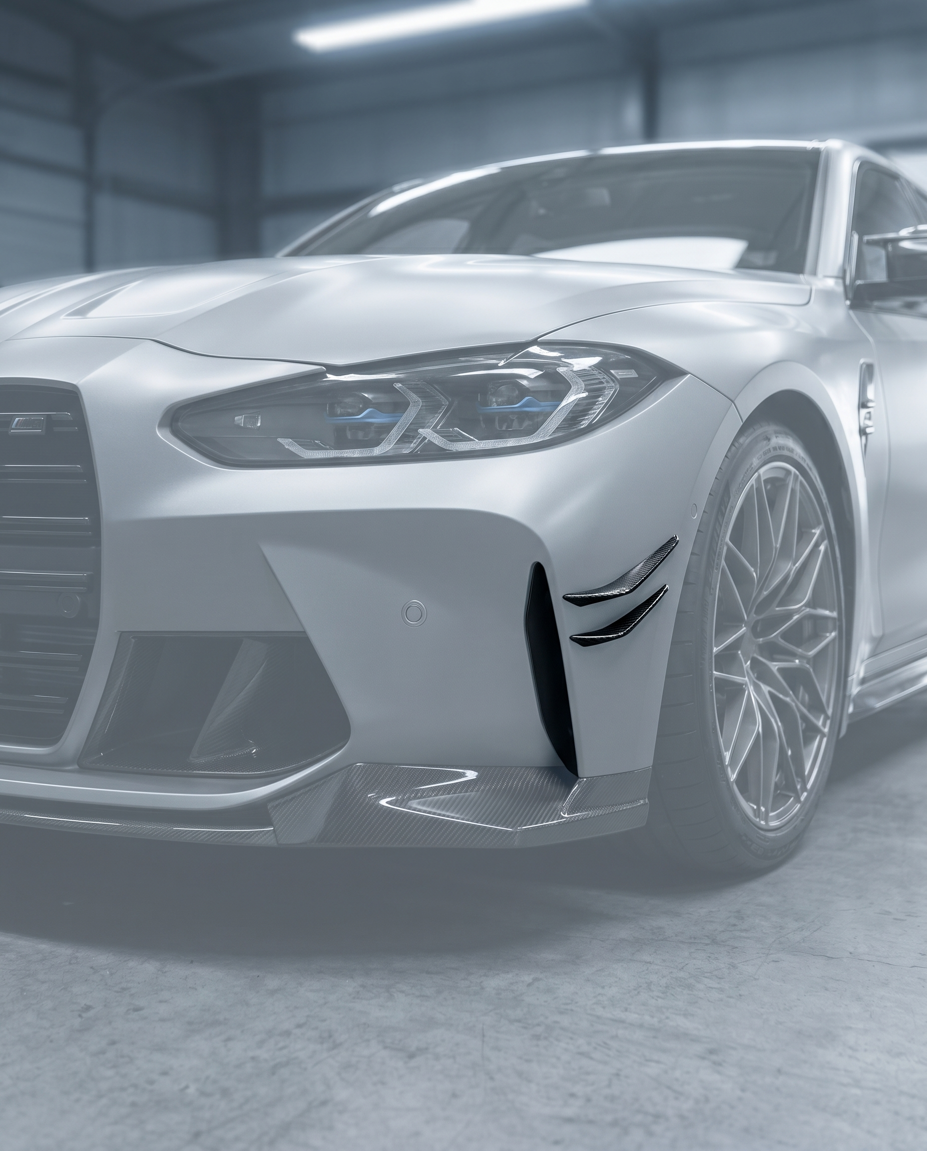 Carbon front canards stuck on ghosted BMW G80 M3 front bumper corner, aggressive aero flicks, blurred premium garage, OEM+ fit
