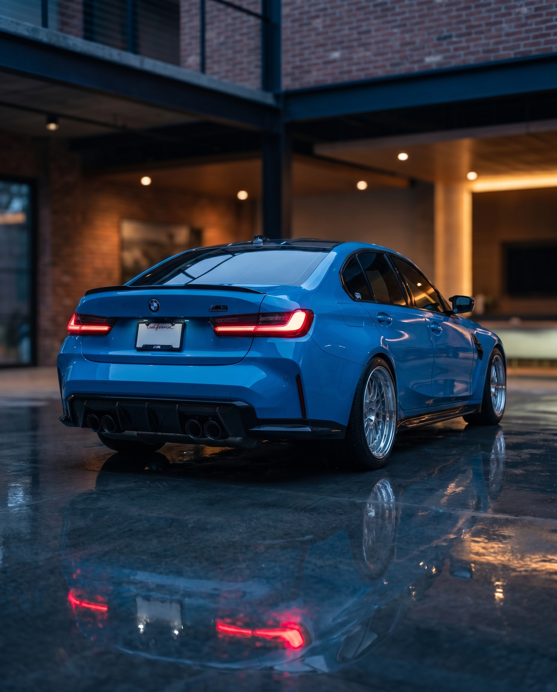 BMW G80 M3 rear at blue-hour dusk with smoked LED tail lights glowing red, reflective ground, stealthy moody motorsport scene