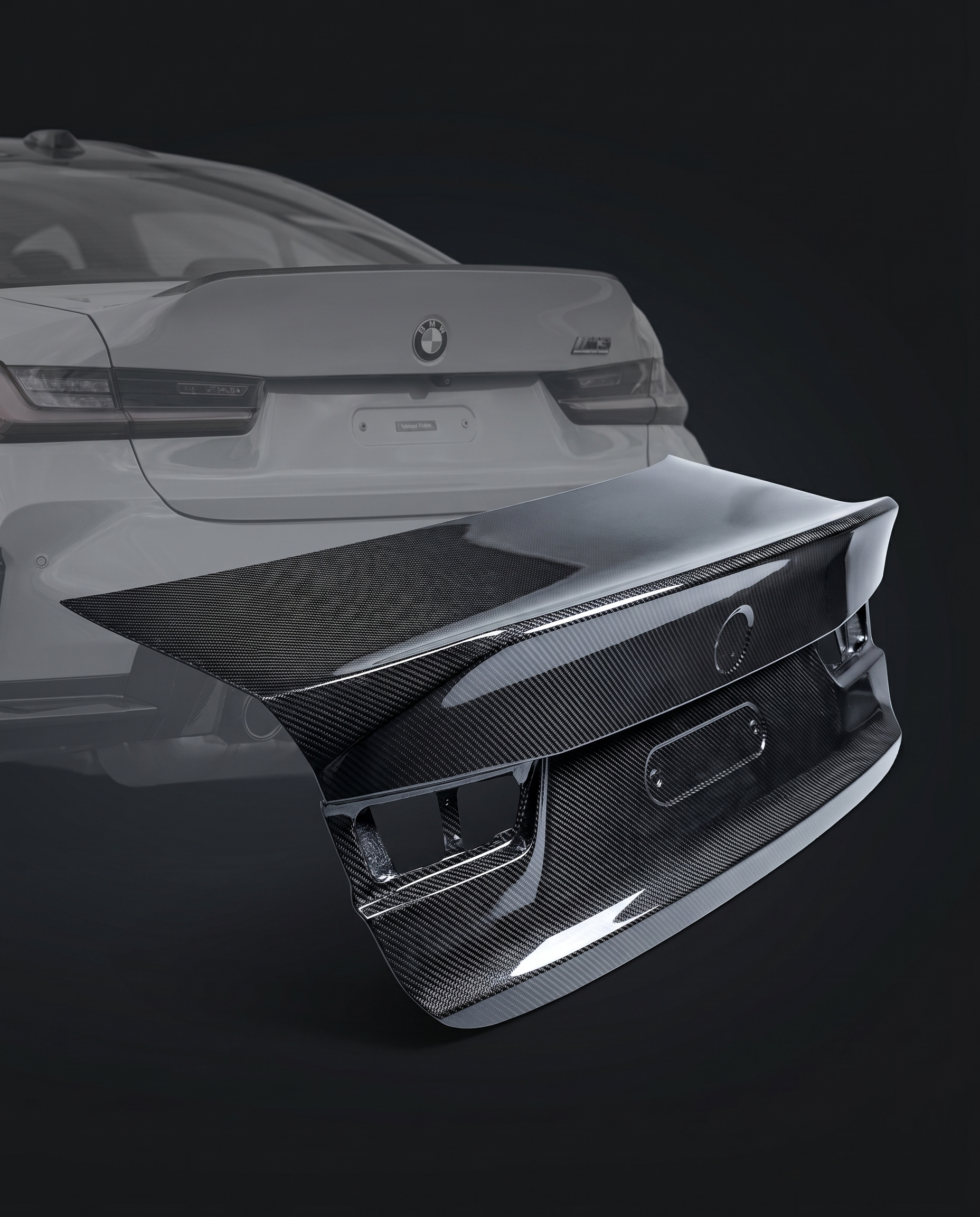 CSL-style dry carbon fiber trunk lid with ducktail for BMW G80 M3, rear ghosted, race-bred silhouette and 2x2 twill weave