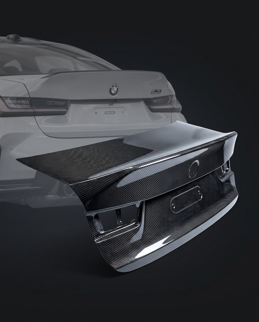 CSL-style dry carbon fiber trunk lid with ducktail for BMW G80 M3, rear ghosted, race-bred silhouette and 2x2 twill weave