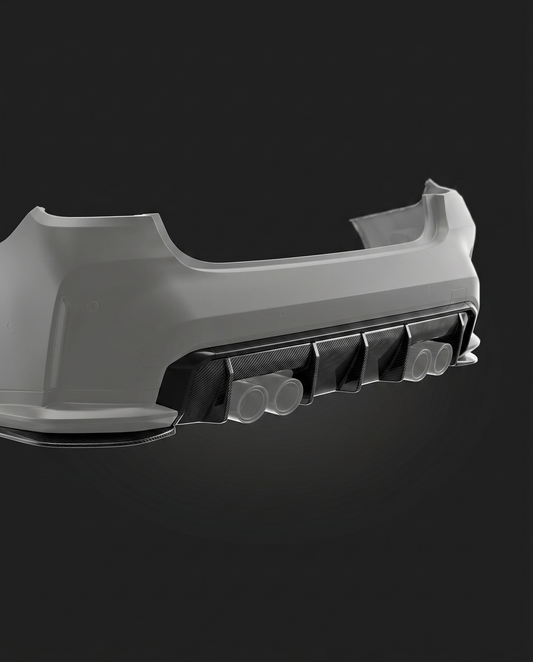 Gloss MP-style dry carbon rear diffuser for BMW G80 M3, low studio hero shot showing fin layout and 2x2 twill weave