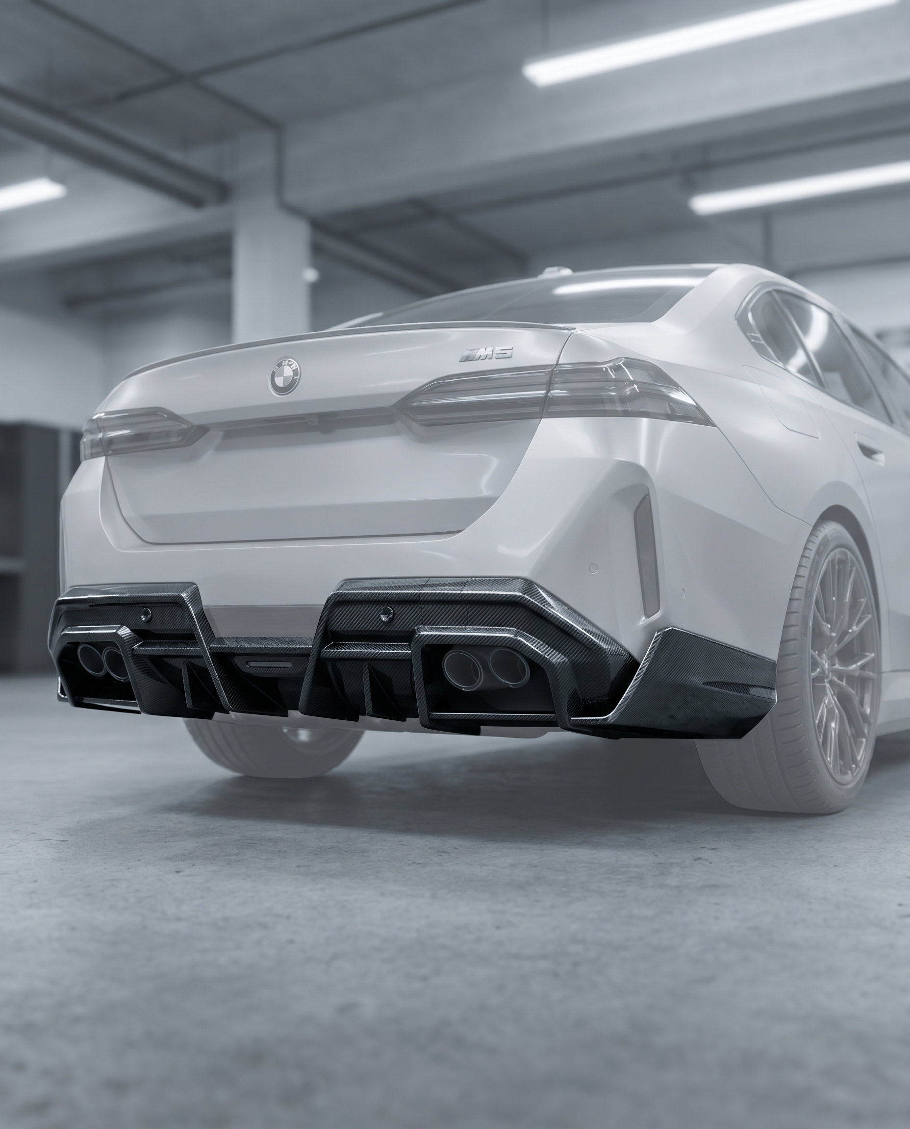 Gloss SQ-style carbon rear diffuser installed under BMW G90 M5 bumper, premium garage lighting shows precise fitment