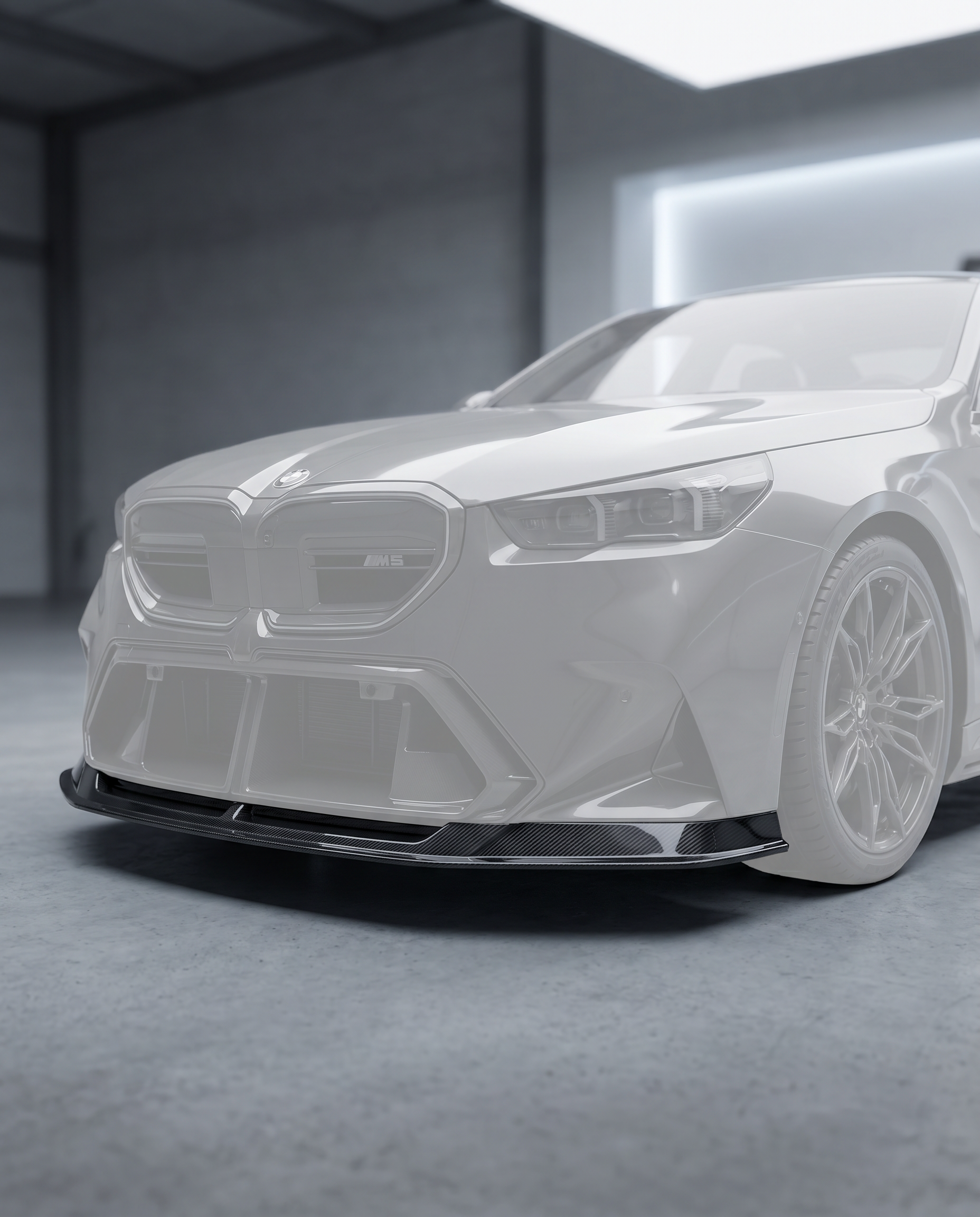LAB-style dry carbon front lip installed low on a ghosted 2025+ BMW G90 M5 bumper in a blurred premium garage