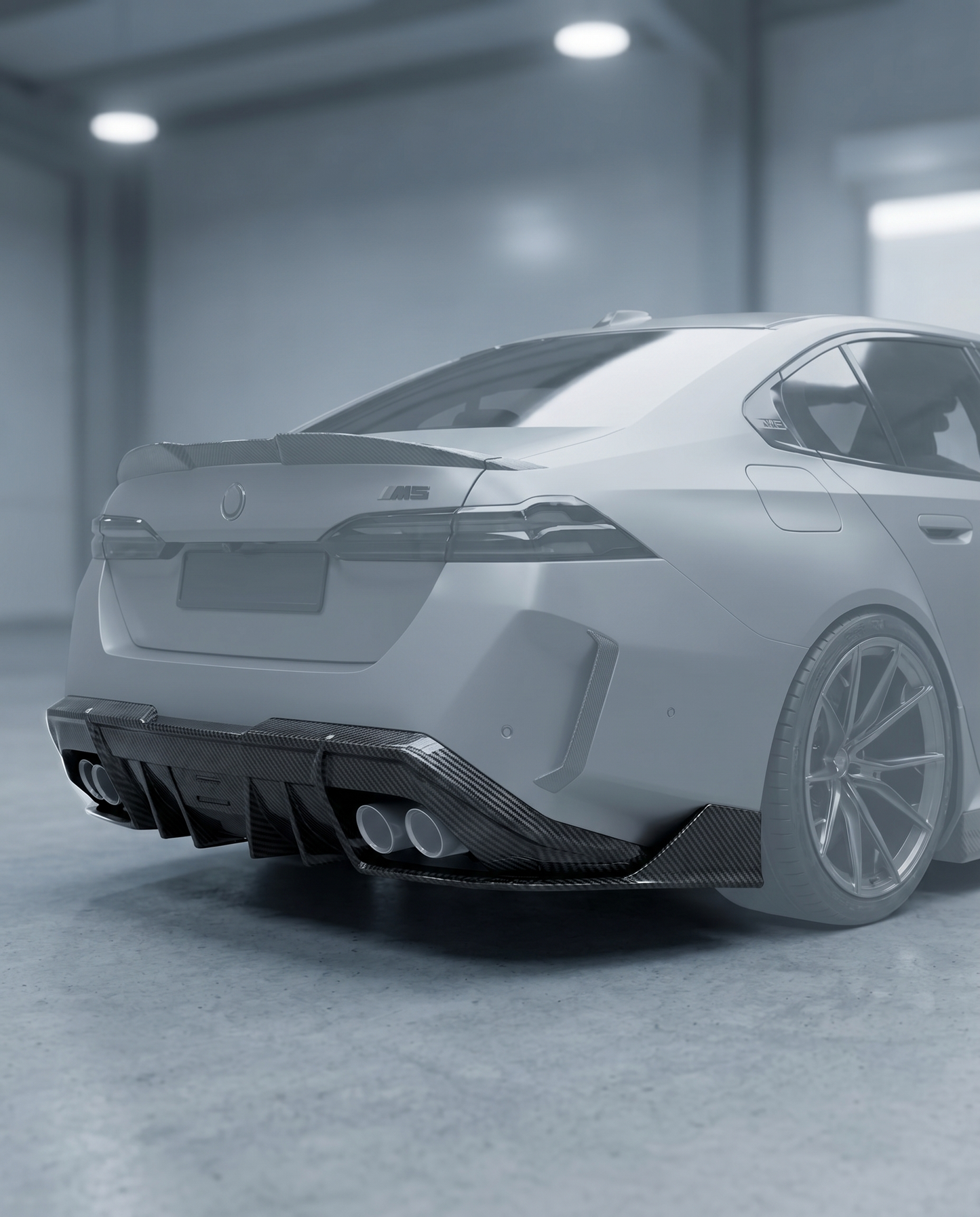 RZ-style dry carbon rear diffuser installed on a ghosted 2025+ BMW G90 M5 rear bumper in a blurred premium garage